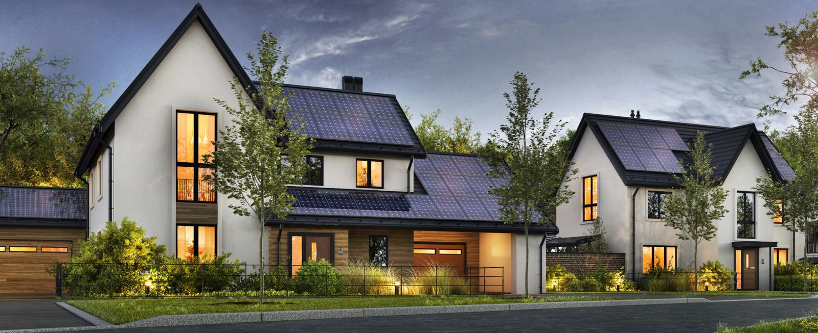 Row of modern homes with solar panels installed on rooftops at dusk by AP Sun Energy in Columbia, SC.